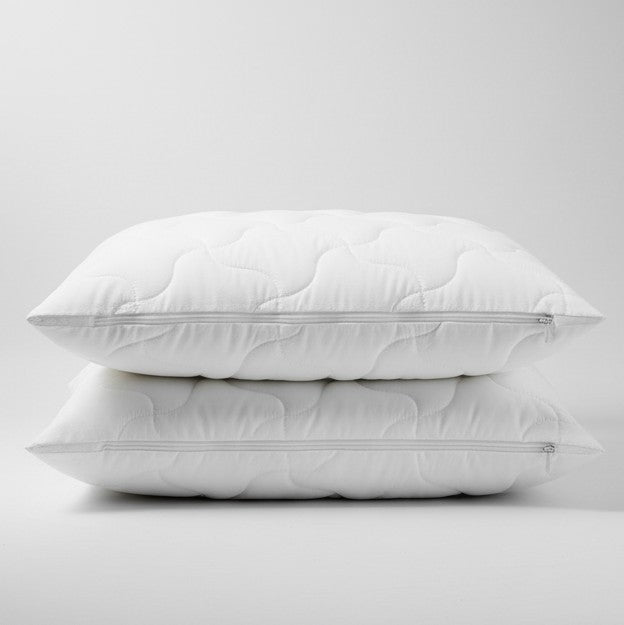Dygsniuota balta pagalvė su 2 užtrauktukais (1 viduje, 1 išorėje)